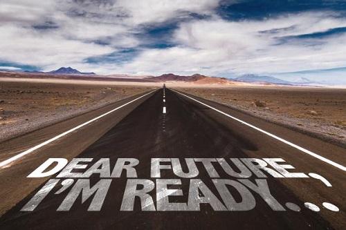 empty road with a sign saying: 'Dear Future - I'm ready'