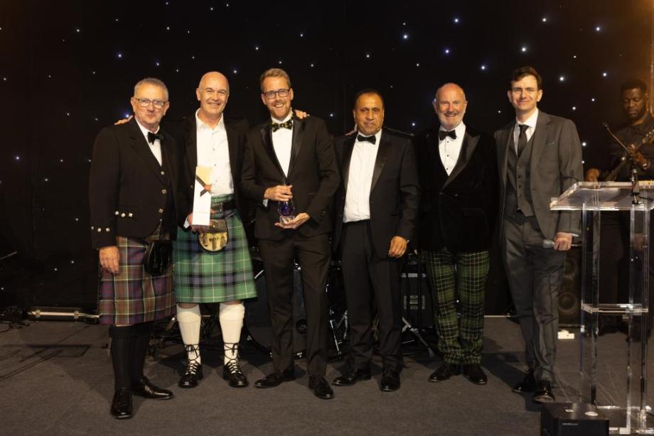 Chris Welch receiving an award