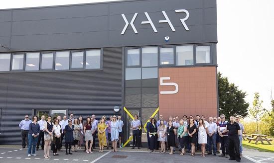 Xaar team outside the new HQ building
