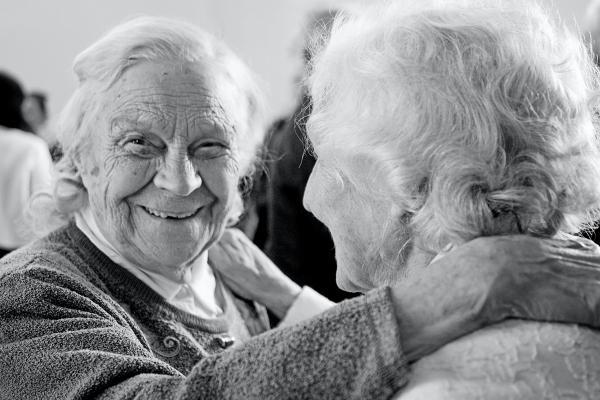 two older women embracing