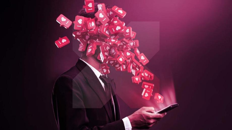 A person holds a phone but their face is obscured by 'Like' symbols