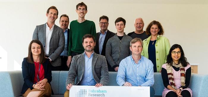  Karolina Zapadka, Head of Accelerate@Babraham (seated front left), Allan Marchington, Managing Director, Head of Life Sciences at Intermediate Capital Group (far left, back row), Derek Jones, CEO, Babraham Research Campus Ltd (middle back row) and Andy Richards CBE, biotech entrepreneur and investor (far right, back row) with the 2021/22 Accelerate@Babraham cohort.