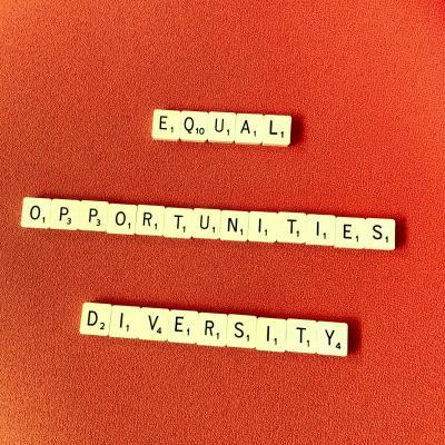 scrabble tiles spell out equal opportunities/ diversity