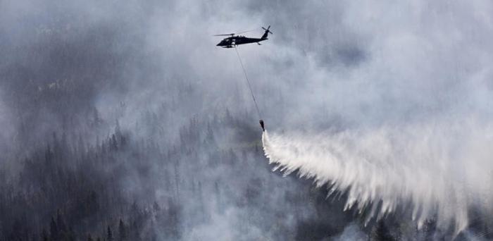   US National Guard working to extinguish wildfires in Alaska  Credit: Balinda O'Neal