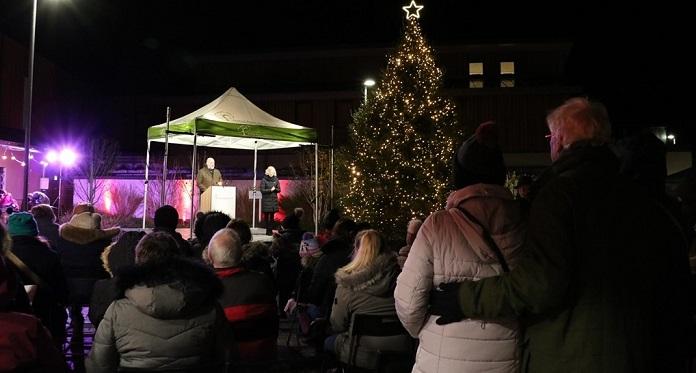 A couple share a tender moment at Arthur Rank Hospice Charity’s Light up a Life event, after the magnificent tree’s twinkling lights are switched on. The lights will now shine through the darkness of the winter evenings, until twelfth night. 