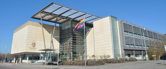 SCDC building with rainbow flag