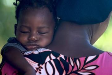 Woman with child in developing world