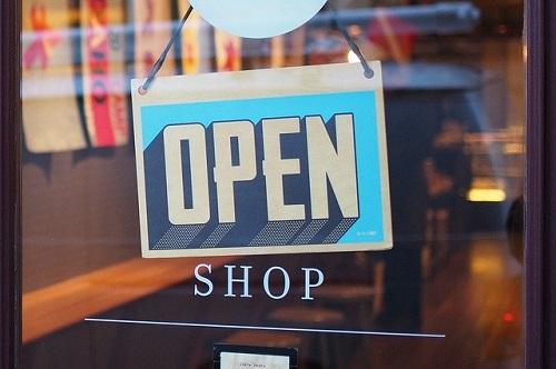 shop door with Open sign/ Image by StockSnap from Pixabay