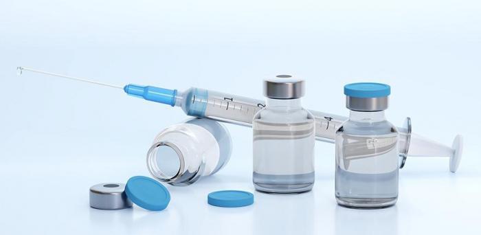   Syringe and vaccine  Credit: MasterTux