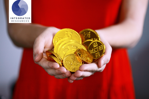 woman holding handful of coins_ https://www.unsplash.com