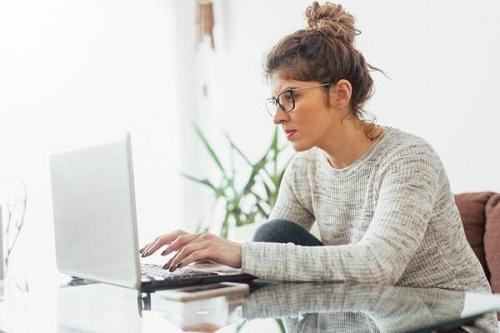 woman working on a laptop_Marketing with purpose_Network Design