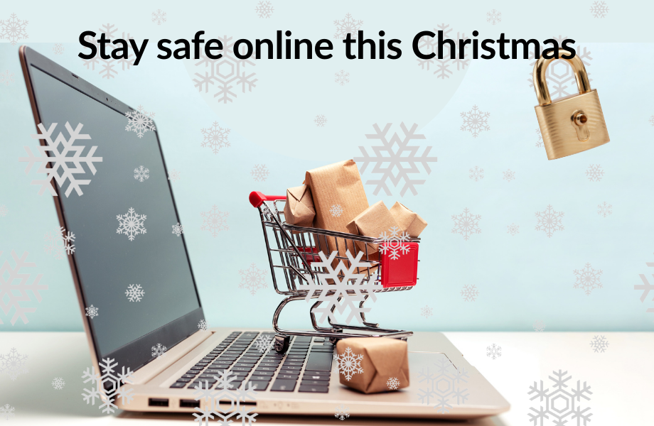 shopping trolley full of gifts sitting on a laptop