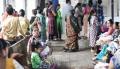 Mothers, children and babies in a waiting area outside a TB clinic in India.(Image credit:  FIND/Ben Phillips).