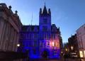 Gonville and Caius lit up in blue