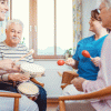 Music therapy aids dementia_ man and woman playing instruments