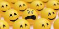 Happy emojis surround one sad/angry face