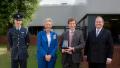 Adrian Dickens, Adder CEO, is presented the Queen's Award for Enterprise by Lord Lieutenant, Mrs Julie Spence OBE QPM