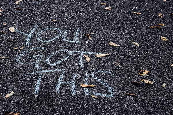 tarmac with the words written in chalk 'you got this'